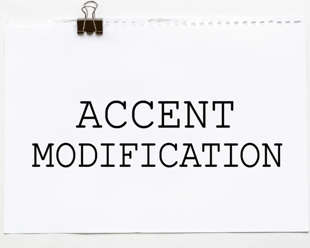 the words "accent modification" on a piece of looseleaf paper